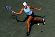 Keys plays a running forehand in the Credit One Charleston Open - Source: Getty